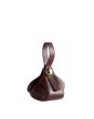 The Sculpted Metal Wristlet Bag